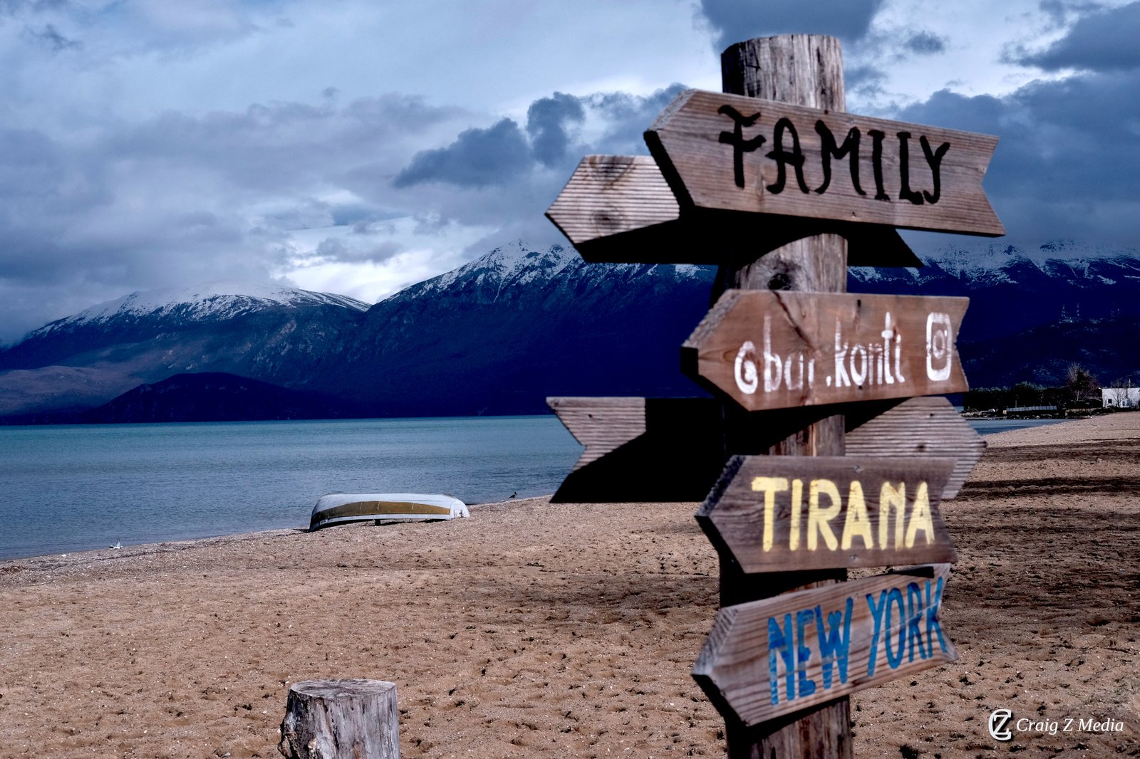 The iconic Pogradec lakefront welcome sign on the promenade — the symbol of a city that opens its arms to all who arrive